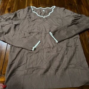 Brown Sweater with White Accents